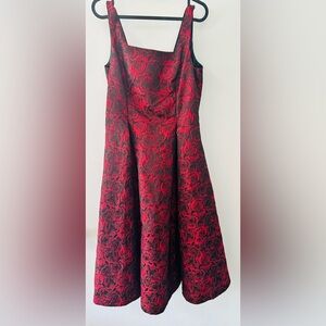 Elegant Red and Black Floral Dress size 6
New never worn without tags
